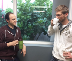 coworkers having coffee together